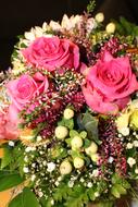 Beautiful bouquet of roses with ornaments