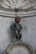 iron statue of a boy peeing