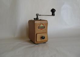 wooden coffee grinder on the table