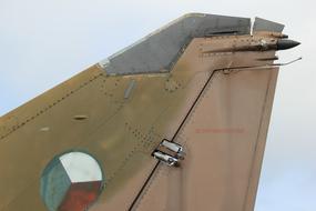 large airplane wing against the sky