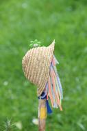 summer hat with ribbons on the pole