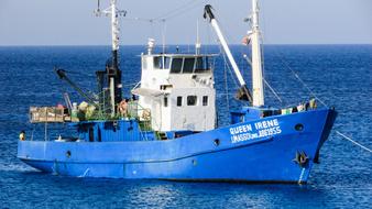 color boat on the sea of blue