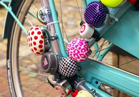 decorated bicycle wheel with badges