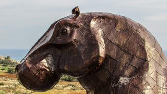stone sculpture of a hippopotamus