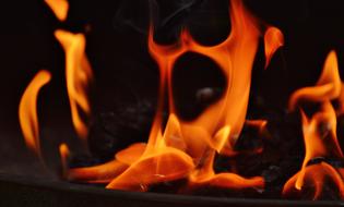 burning tongues of fire in the night