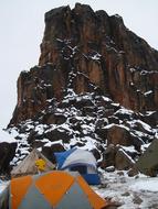 big rock in white snow