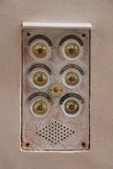 The old doorbell in the wall