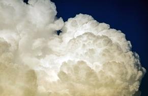 white fluffy cloud in the sky