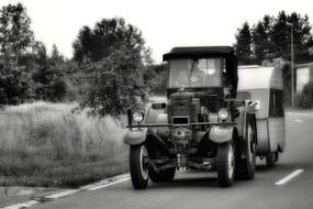 tractor driving down the road