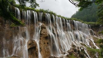flowing waterfall off a cliff