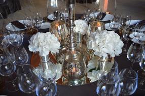 bouquets of flowers on a set table