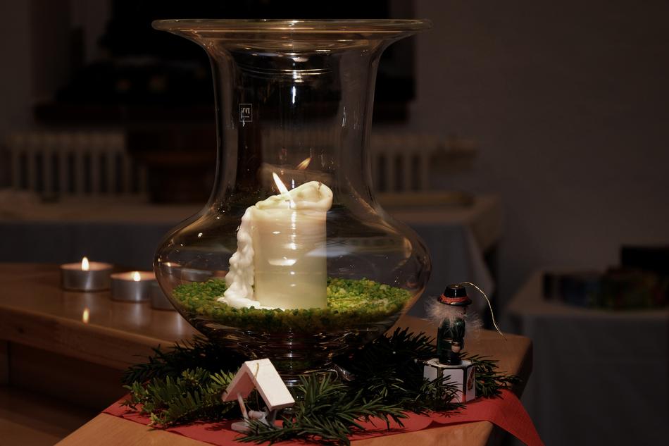 wax candle in a glass vase