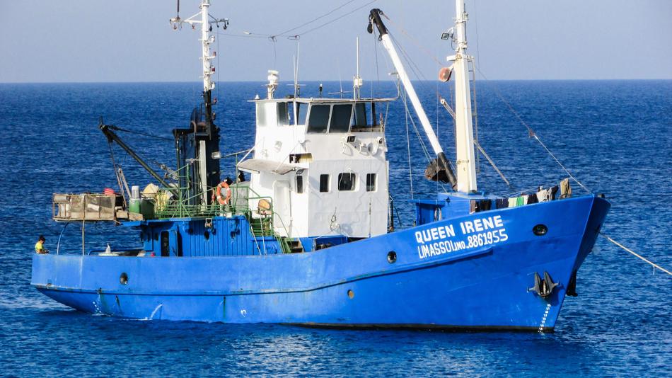 color boat on the sea of blue