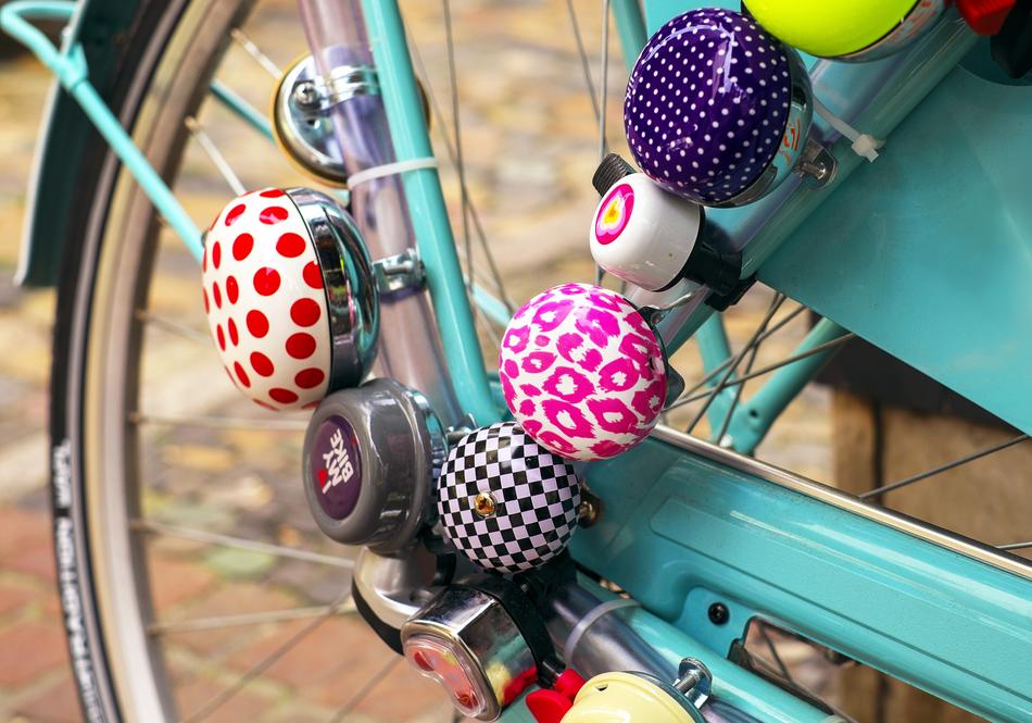 decorated bicycle wheel with badges
