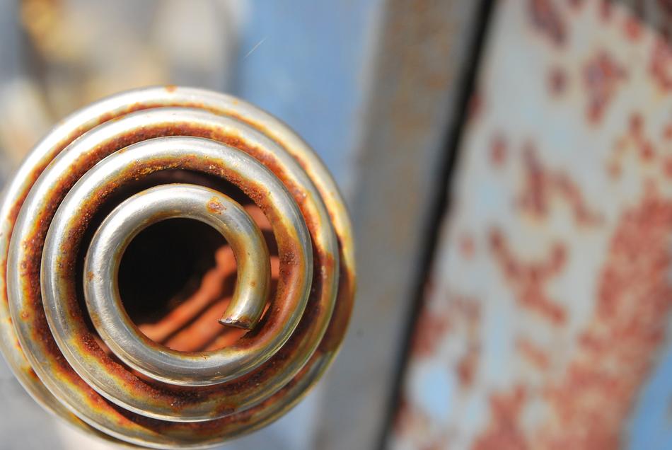 old rusty coil in the pipe