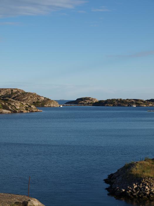 calm surface of the sea by the rocks