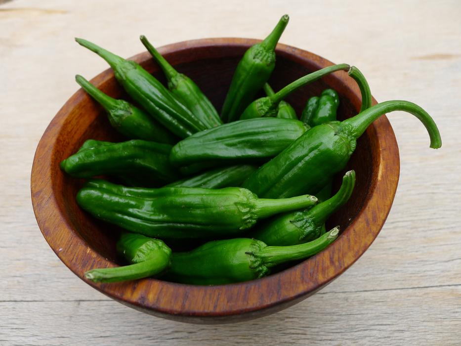 ripe green hot peppers in a plate