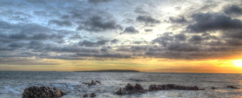 sunset against the ocean