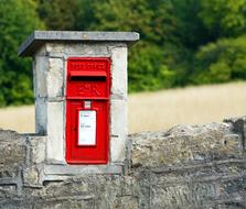 cute mailbox on the fence