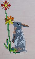 geometric drawing of a hare with a flower