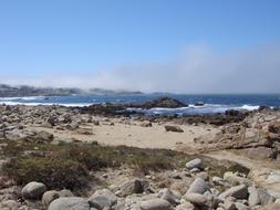 stone wild beach on the sea