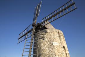 windmill against a blue sky