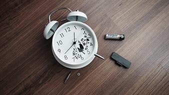 disassembled alarm clock on the table
