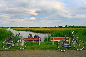 bicycles parked by the bench