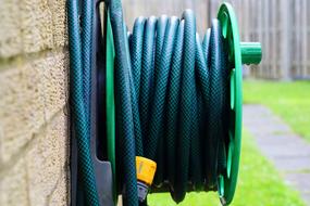 swirled hose against the wall