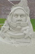 sand sculpture of a man face