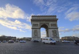 car near the arc de triomphe
