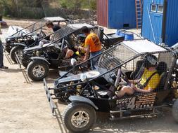 race cars in front of the house