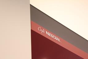 sign on the roof of the red