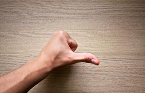 hand in front of the table