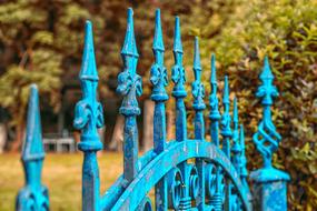 blue beautiful fence with a gate