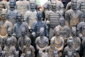 stone sculptures of soldiers in armor