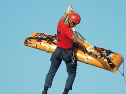 man in the helmet on the air rescue