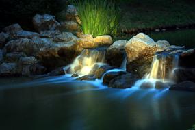 beautiful waterfall with lighting
