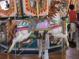 wooden colored horse on the ride