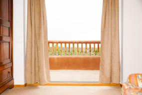 cozy balcony with landscape curtains