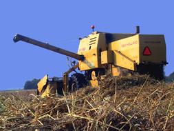 farmer harvesting combine