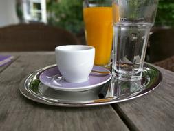 juice and water near the cup