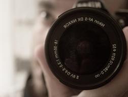 camera lens close-up on blurred background