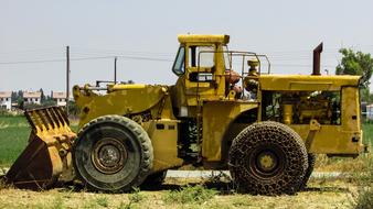 yellow farm bulldozer