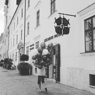 walking man with balloons