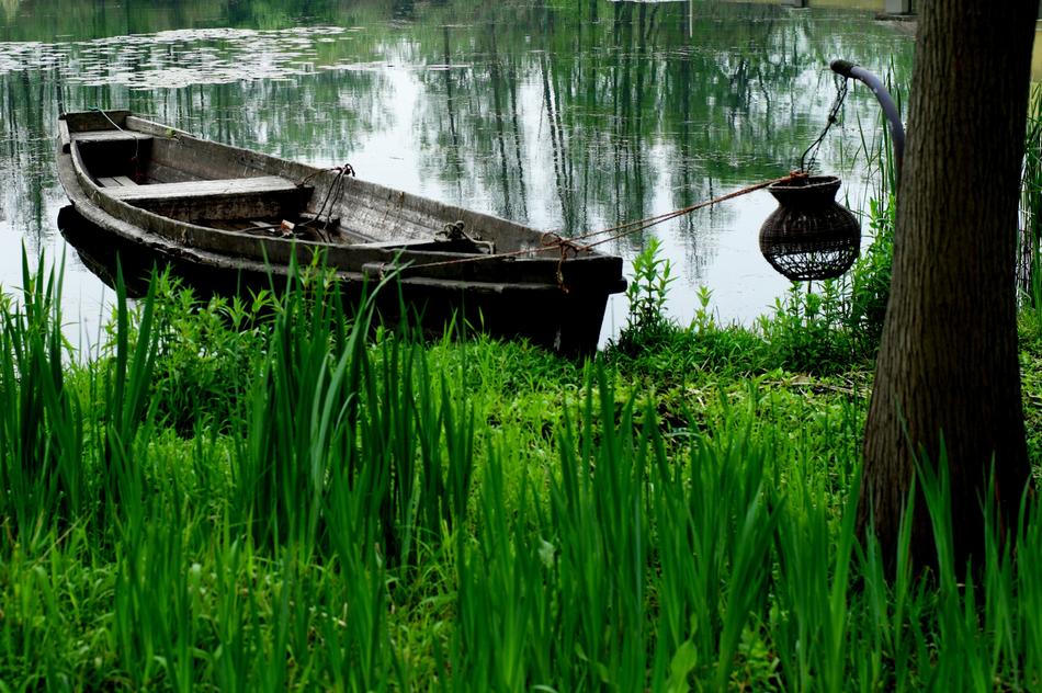 wooden boat by the recreation area