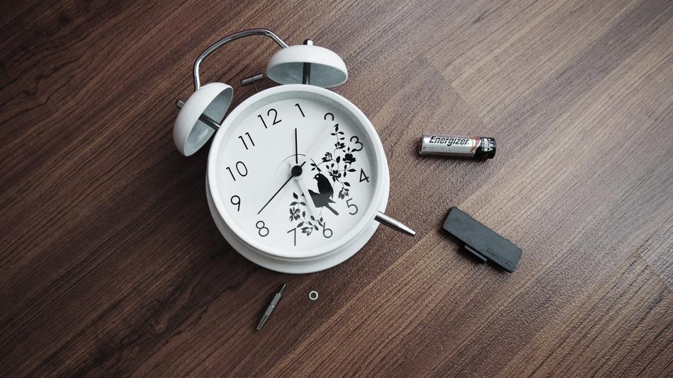 disassembled alarm clock on the table