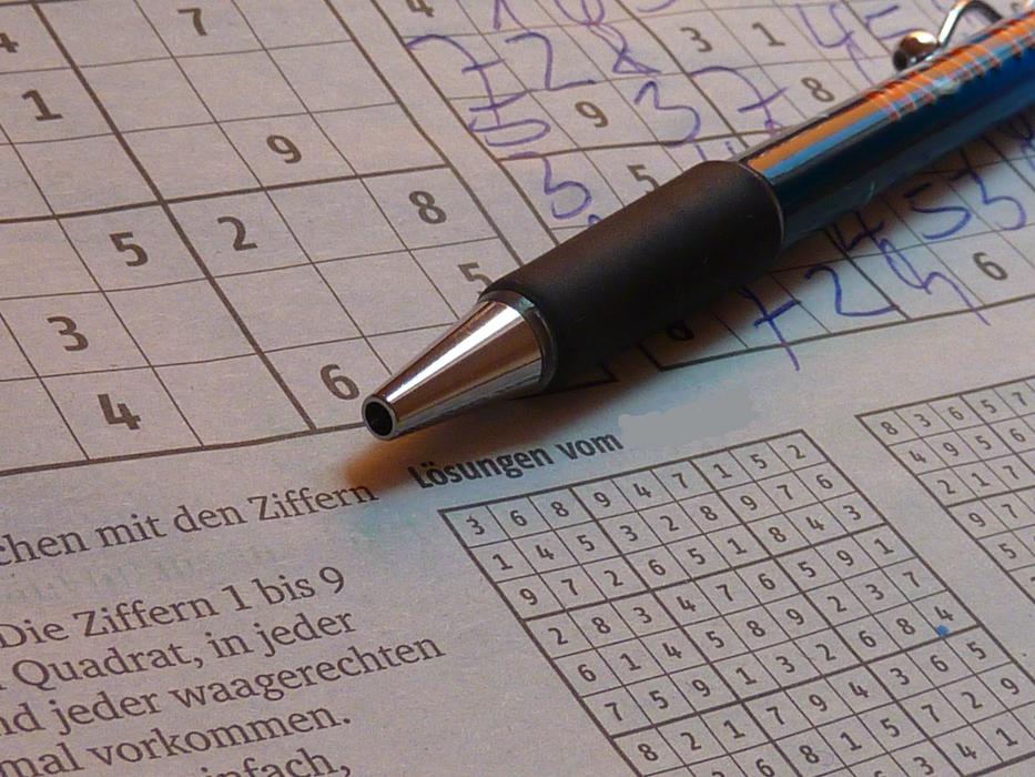 black pen on sudoku paper