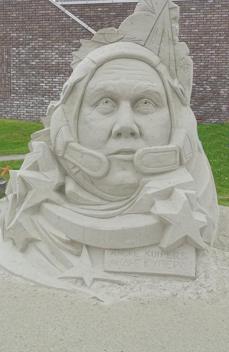 sand sculpture of a man face