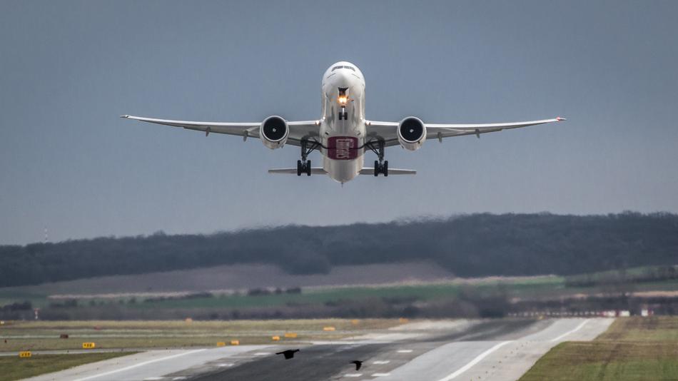 plane taking off upwards